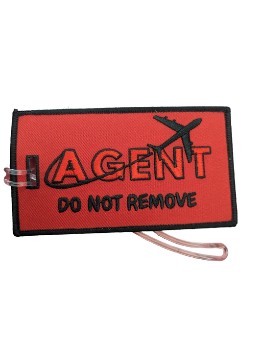 AGENT. DO NOT REMOVE Luggage Tag